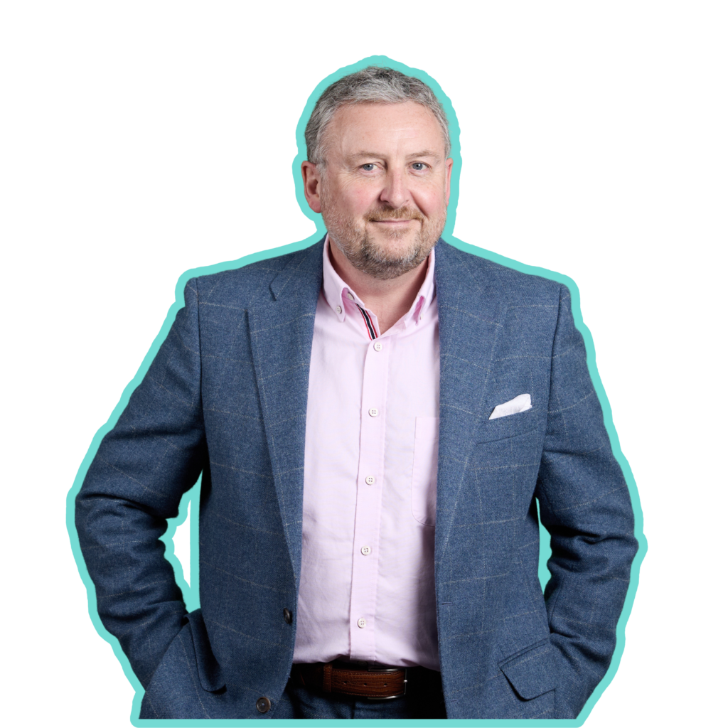 Anthony Singleton smiling with his arms by his side