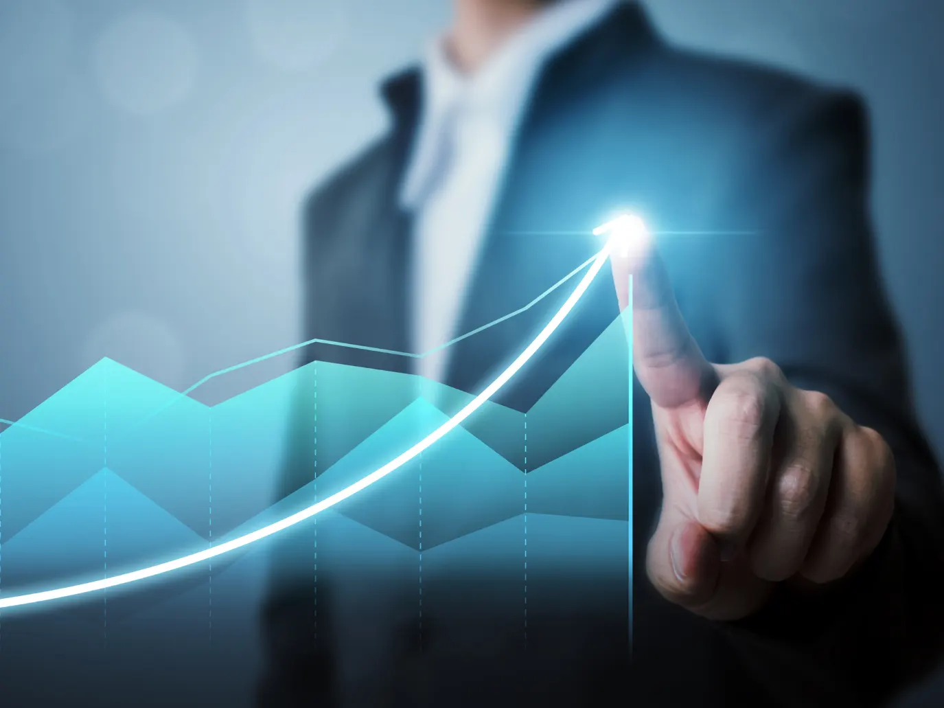 A person reaching out and touching a growth graph